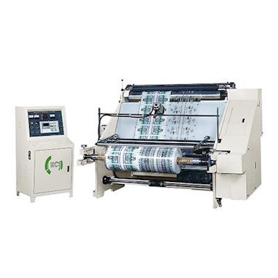 Doctoring and Rewinding Machine